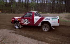 Jim Cox / Kaari Cox drift out of a 90-left on SS2 in their Chevy S-10.