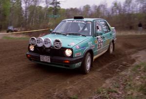 Larry Warrington / Steffen Rampelberg drift their VW Jetta through a 90-left on SS2.