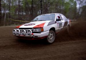 Rob Dupree / Travis Kriza at speed through a 90-left on SS2 in their Audi 100 Quattro.