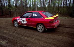 Gerardo Pin / Mike Callier come out of a 90-left on SS2 in their Ford Escort GT.