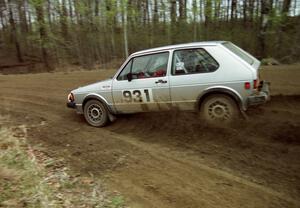 Chris Wilke / Mike Wren drift hard through a 90-left on SS2 in their VW Rabbit.