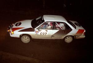 Rob Dupree / Travis Kriza at speed in their Audi 100 Quattro at night.