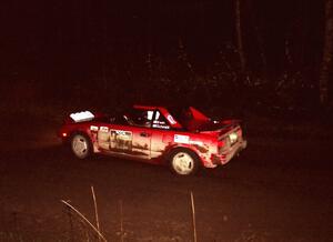 Steve Irwin	/ Phil Schmidt at speed at night in their Toyota MR2.