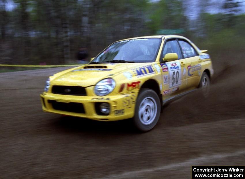 Steve Gingras / Phil Strohm drift their Subaru WRX through a 90-left on SS2.