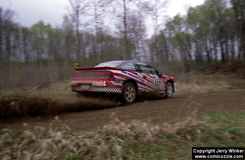 Mike Cienkosz / Yurek Cienkosz set up their Mitsubishi Eclipse GSX for a 90-left on SS2.