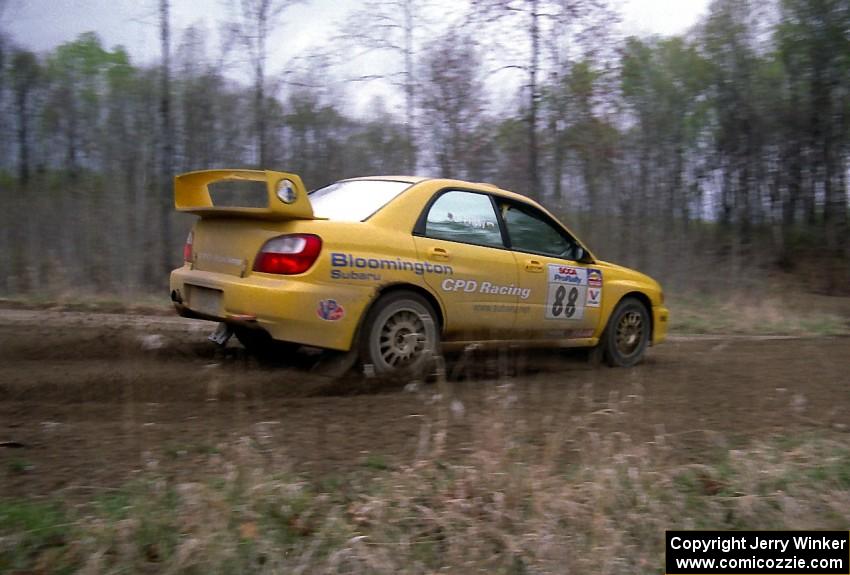 Graham Price / Scott Putnam set up their Subaru WRX STi for a 90-left on SS2.