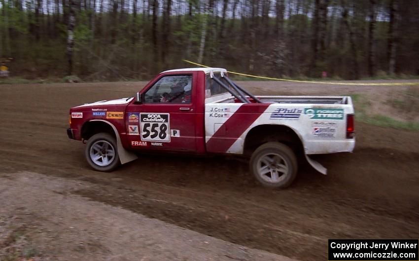 Jim Cox / Kaari Cox drift out of a 90-left on SS2 in their Chevy S-10.