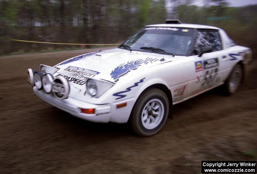 Bob Cutler / John Atsma drift their Mazda RX-7 through a 90-left on SS2.