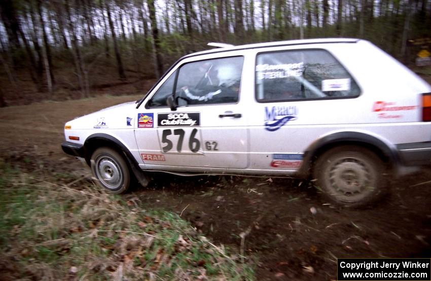 Doug Davenport / Rob Bohn get close at a 90-right on SS2 in their VW Golf.