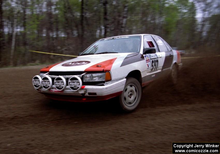 Rob Dupree / Travis Kriza at speed through a 90-left on SS2 in their Audi 100 Quattro.