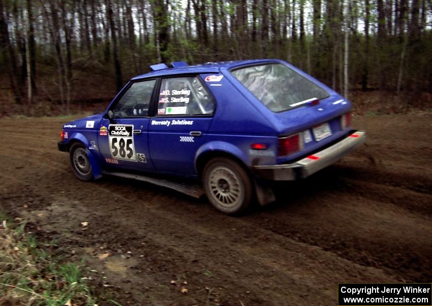 Dave Sterling / Stacy Sterling drift their Dodge Omni GLH-S through a 90-left on SS2.