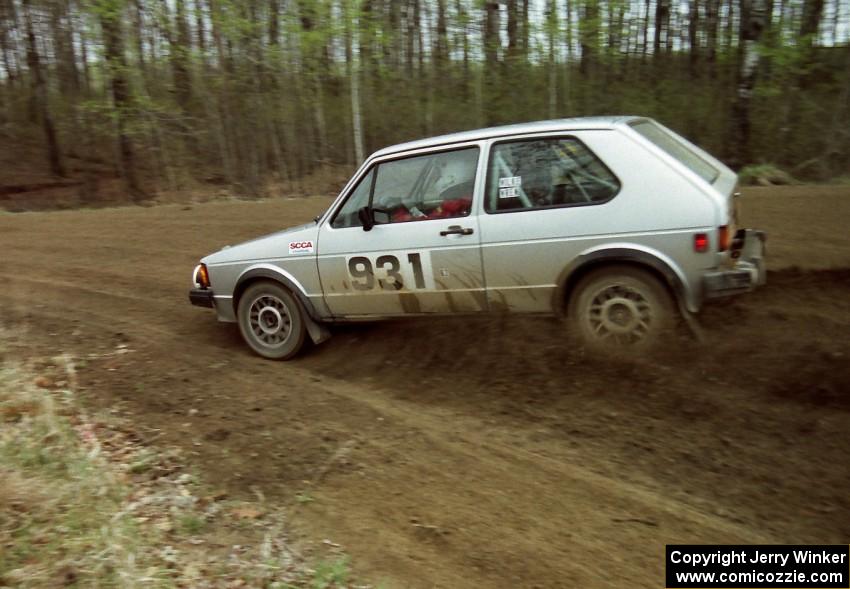 Chris Wilke / Mike Wren drift hard through a 90-left on SS2 in their VW Rabbit.