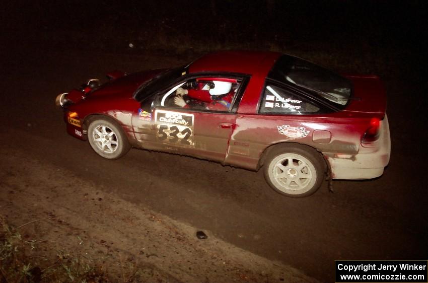 Dave LaFavor / Bob LaFavor drift their Eagle Talon through a sweeper at night.