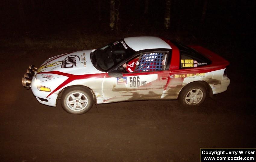 Matt Huuki / Janell Huuki at speed at night in their Eagle Talon.