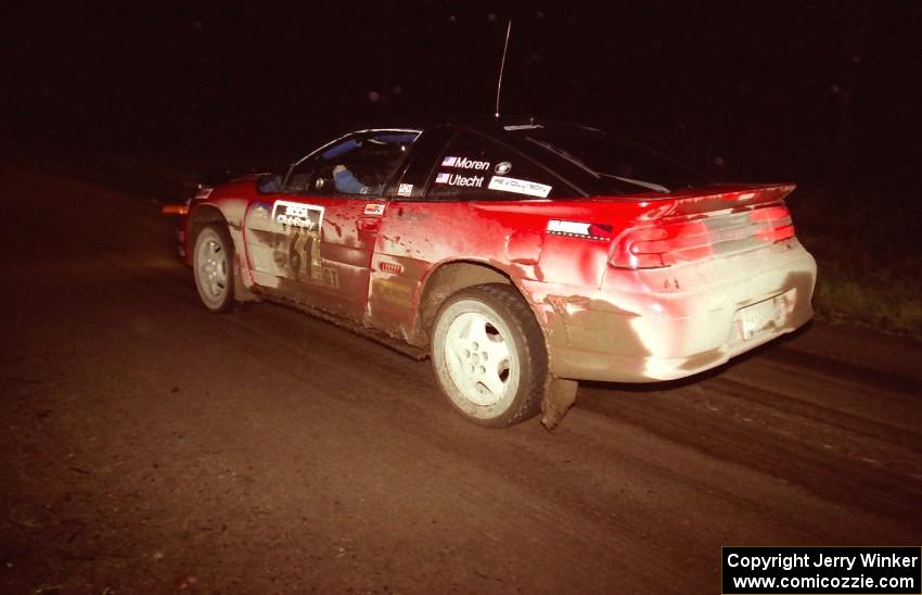 Adam Moren / Mark Utecht at speed at night in their Mitsubishi Eclipse GSX.
