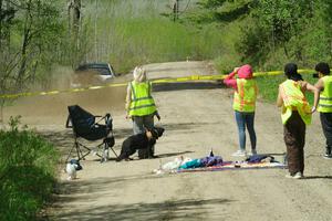 Marshals watch John Farrow / Michael Farrow Subaru WRX on SS2, Blue Trail I.