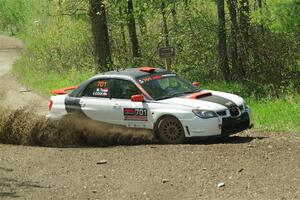 Jason Cook / Maggie Tu Subaru WRX on SS2, Blue Trail I.