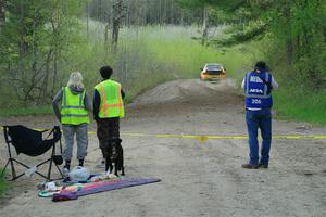 Marshals watch Steve Gingras / Katie Gingras Subaru Impreza on SS5, Blue Trail II.