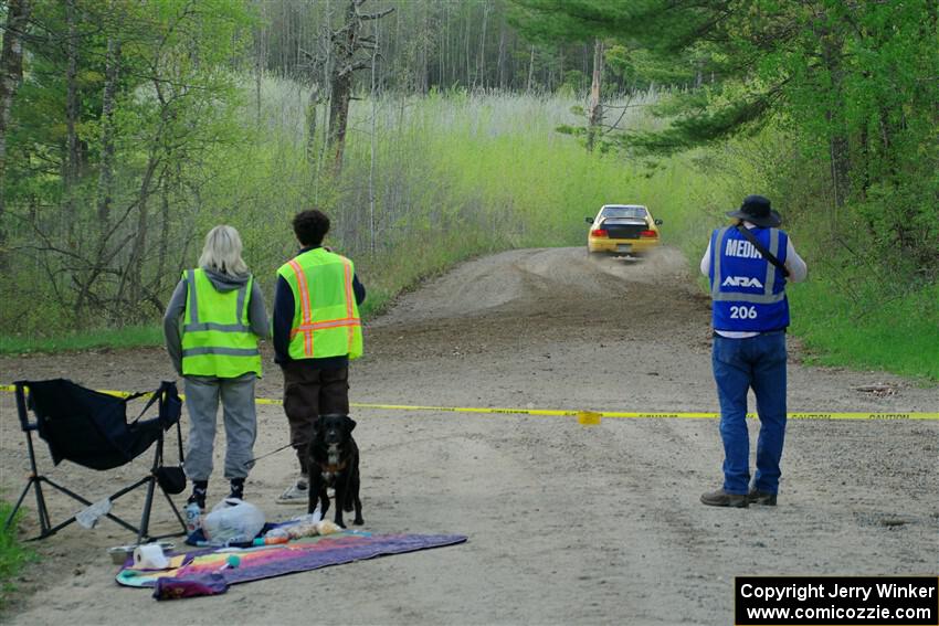 Marshals watch Steve Gingras / Katie Gingras Subaru Impreza on SS5, Blue Trail II.