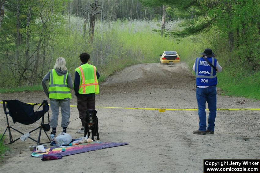 Marshals watch Steve Gingras / Katie Gingras Subaru Impreza on SS5, Blue Trail II.