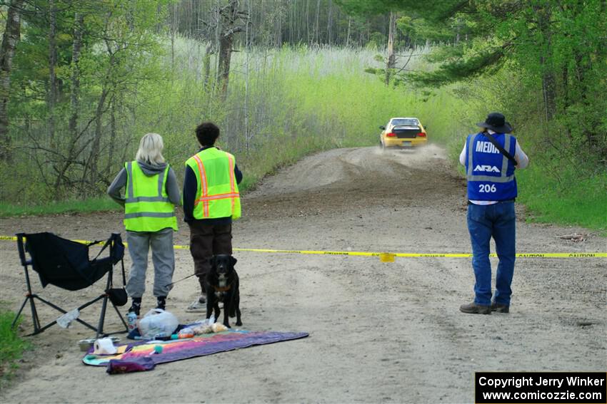Marshals watch Steve Gingras / Katie Gingras Subaru Impreza on SS5, Blue Trail II.