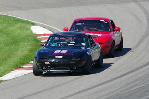 Cody Lindman's STL Mazda Miata and Garrett Taylor's Spec Miata Mazda Miata