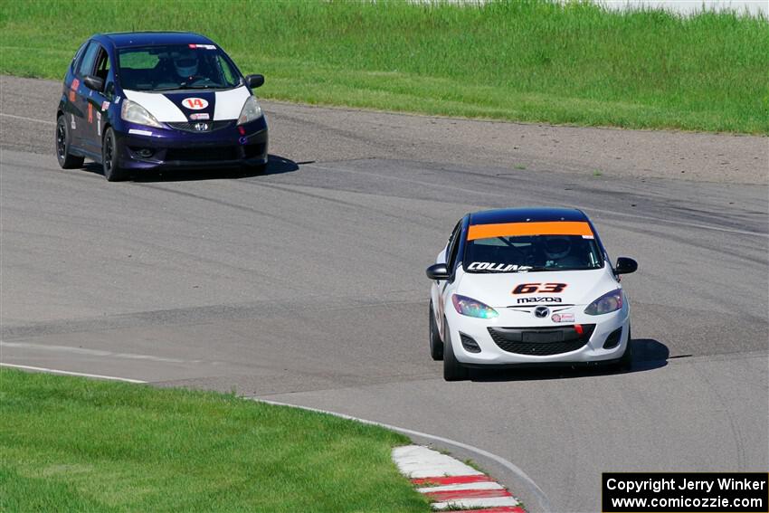 Bill Collins' B-Spec Mazda 2 and Andrew Janssen's B-Spec Honda Fit