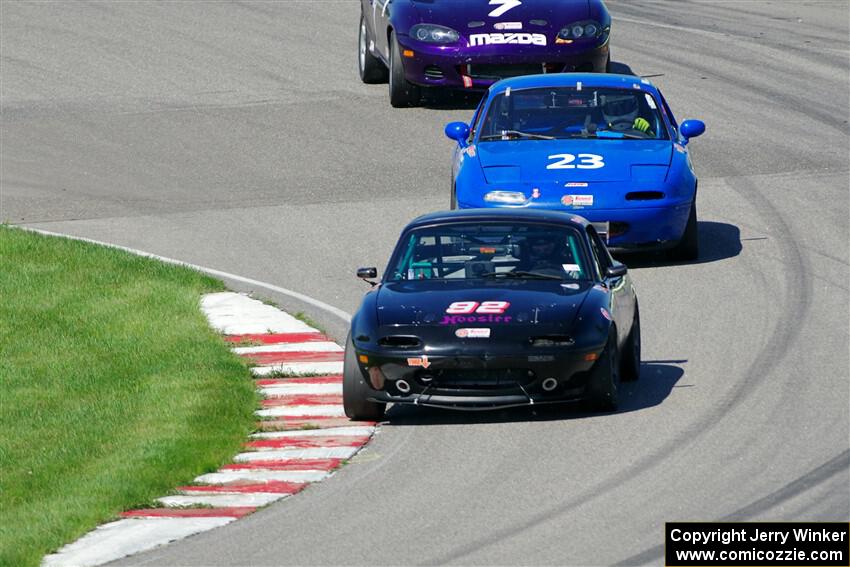 Cody Lindman's STL Mazda Miata, George Ellis' Spec Miata Mazda Miata and Geoff Youngdahl's Spec Miata Mazda Miata