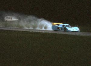 John Paul, Jr.'s Lola T-600/Chevy throws a plume of mist out the back down the Kinnard Straight.