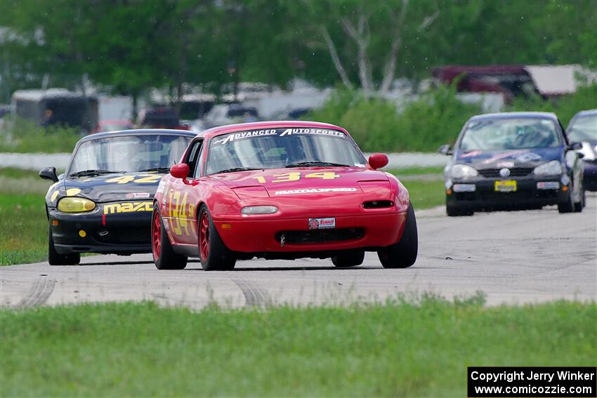 Eric Chang's and Greg Youngdahl's Spec Miata Mazda Miatas