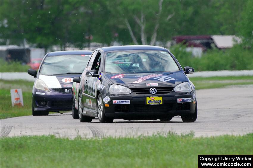 Tom Daly's T4 VW Rabbit and Andrew Janssen's B-Spec Honda Fit