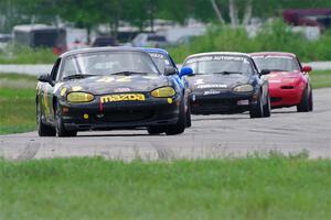 Greg Youngdahl's, Bruce Allen's, Mike Soward's and Eric Chang's Spec Miata Mazda Miatas