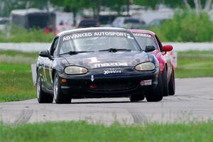 Mike Soward's and Eric Chang's Spec Miata Mazda Miatas