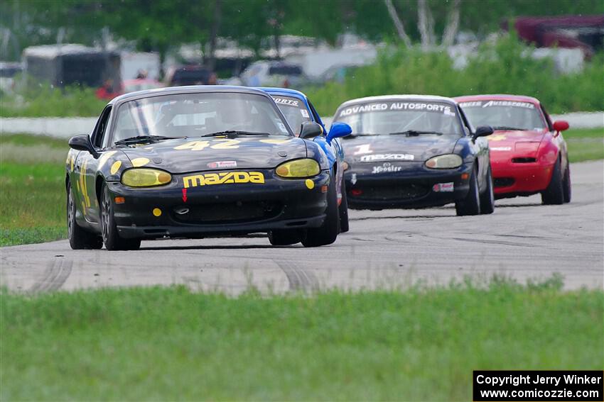 Greg Youngdahl's, Bruce Allen's, Mike Soward's and Eric Chang's Spec Miata Mazda Miatas