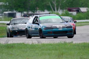 Mark Utecht's ITJ Honda Civic and Sam Nogosek's Spec Miata Mazda