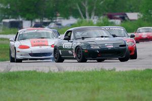 Sam Nogosek's, Chris Craft's and Kyle Greenhill's Spec Miata Mazda Miatas