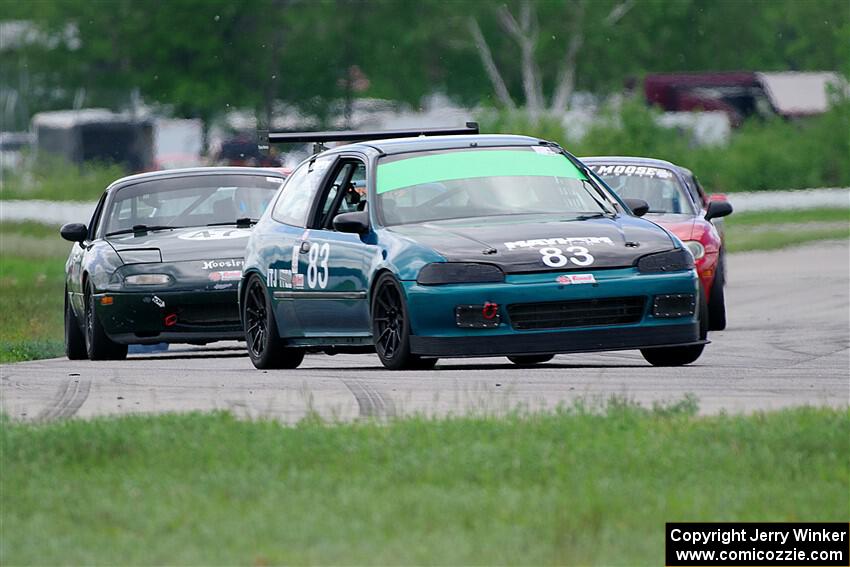 Mark Utecht's ITJ Honda Civic and Sam Nogosek's Spec Miata Mazda