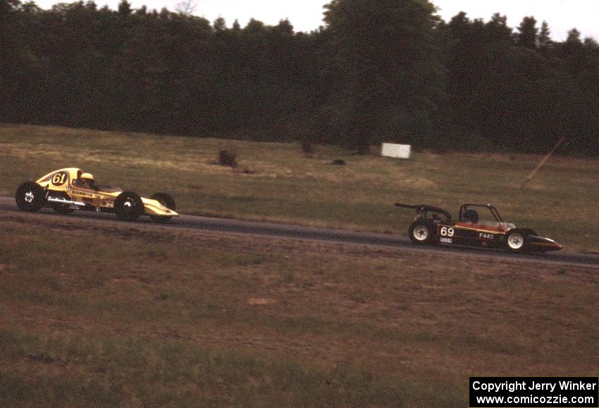 Dave Erickson's Lynx B Formula Vee chases Al Harhay's Red Devil F440 through turn 4.