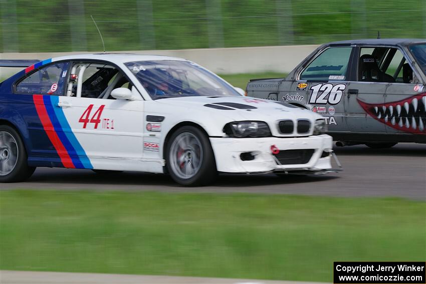James Golly's ITE-1 BMW M3 passes Austin Hallberg's ITA BMW 328