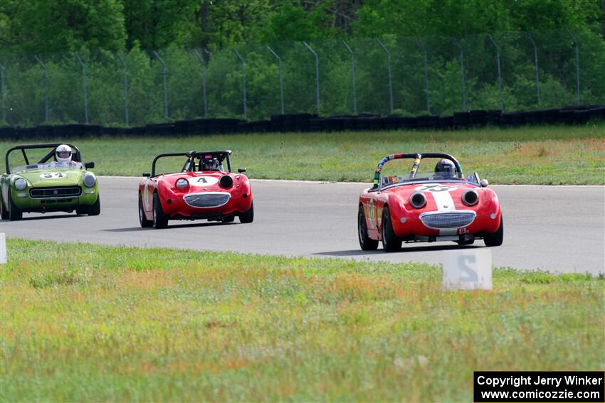 John Daniels, Jr.'s Austin-Healey Sprite, Tom Daly's Austin-Healey Sprite and Dan L'Heureux's MG Midget