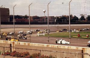 The grid takes a warm-up lap before the start.