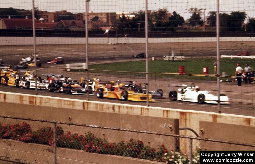 The grid lines up to take the green flag.