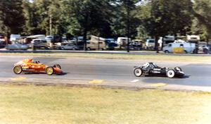 Jerry Knapp (Caldwell D-13) leads Darrell Peterson (Lynx B) out of corner ten during Formula Vee practice.