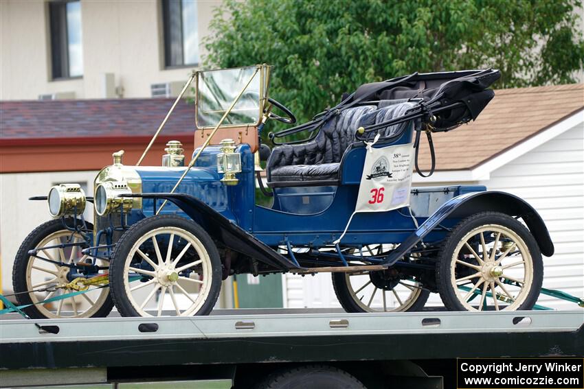 Becky Miller's 1909 Maxwell comes in on the flatbed in Buffalo.