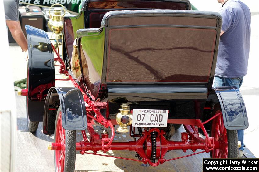 Brian Heyd's 1907 Cadillac is unloaded from the flatbed in Buffalo.