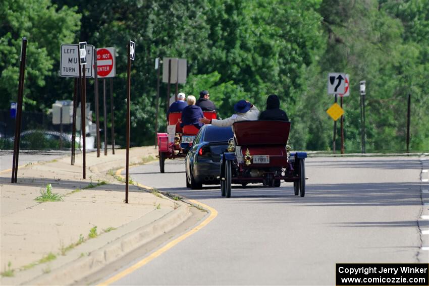 Gary Schlomann's 1907 Ford and Tim Wiggins' 1904 Ford head toward New Brighton.