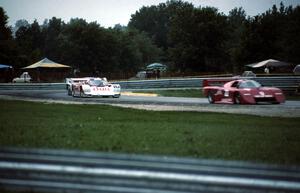 Art Leon / Skeeter McKitterick - March 84G/Chevrolet, and Porsche 962s of Drake Olson / Bobby Rahal and Al Holbert / Derek Bell