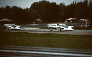 Pete Halsmer / John Morton - Porsche 962 leads its teammate Jim Busby / Jochen Mass - Porsche 962