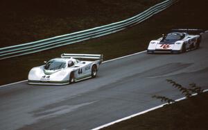 Bob Tullius / Chip Robinson Jaguar XJR-5 leads the Whitney Ganz / Ken Madren Hawk-March 85G/Buick