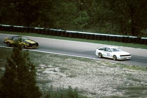 Tommy Archer - Chevy Cavalier RS leads Kal Showket - Dodge Daytona (IMSA RS race)